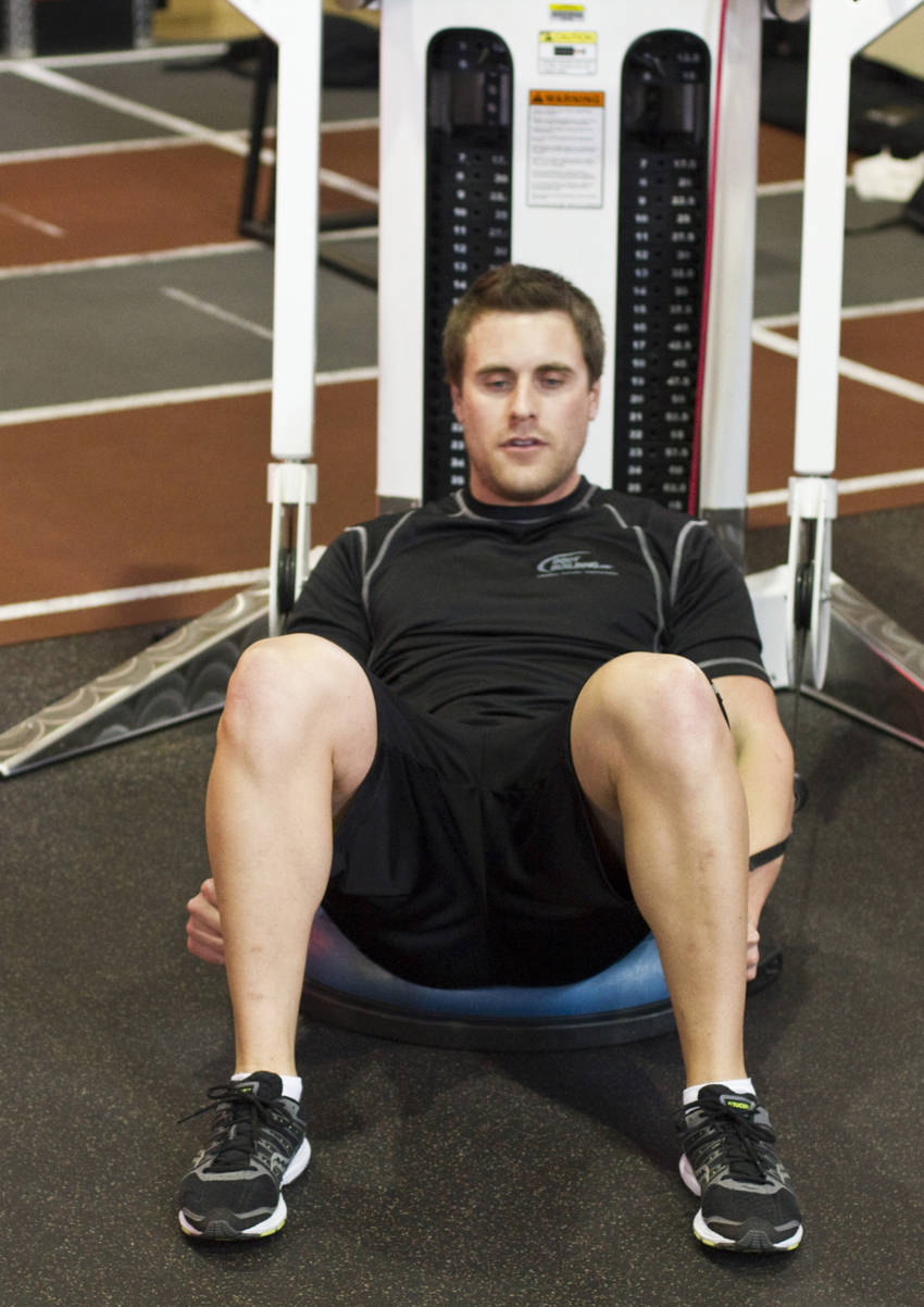 Bosu Ball Cable Crunch With Side Bends — start position