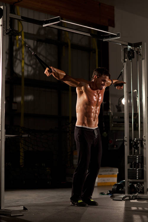 Cable Iron Cross — start position
