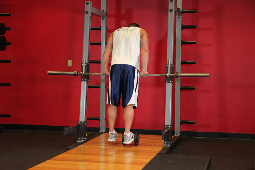 Calf Raise On A Dumbbell — start position