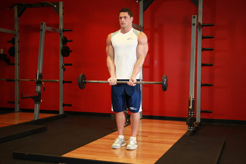 Close-Grip Standing Barbell Curl — start position