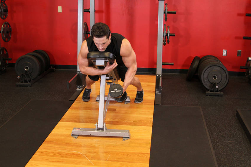 Dumbbell Lying One-Arm Rear Lateral Raise — start position