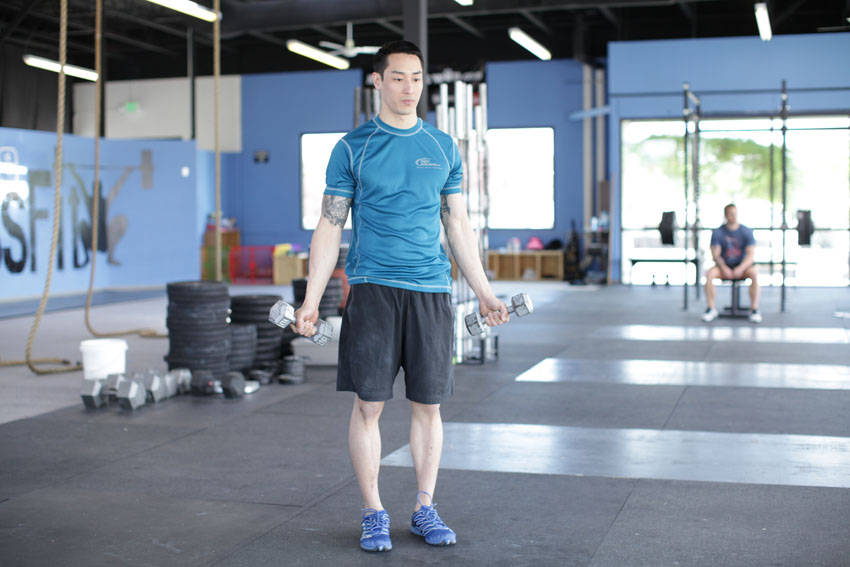 Dumbbell Scaption — start position
