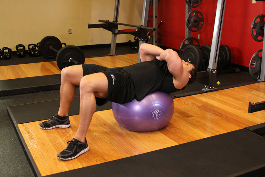 Exercise Ball Crunch — start position