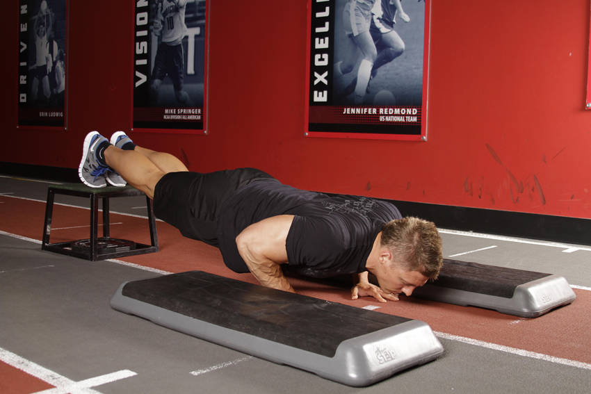 Incline Push-Up Depth Jump — start position