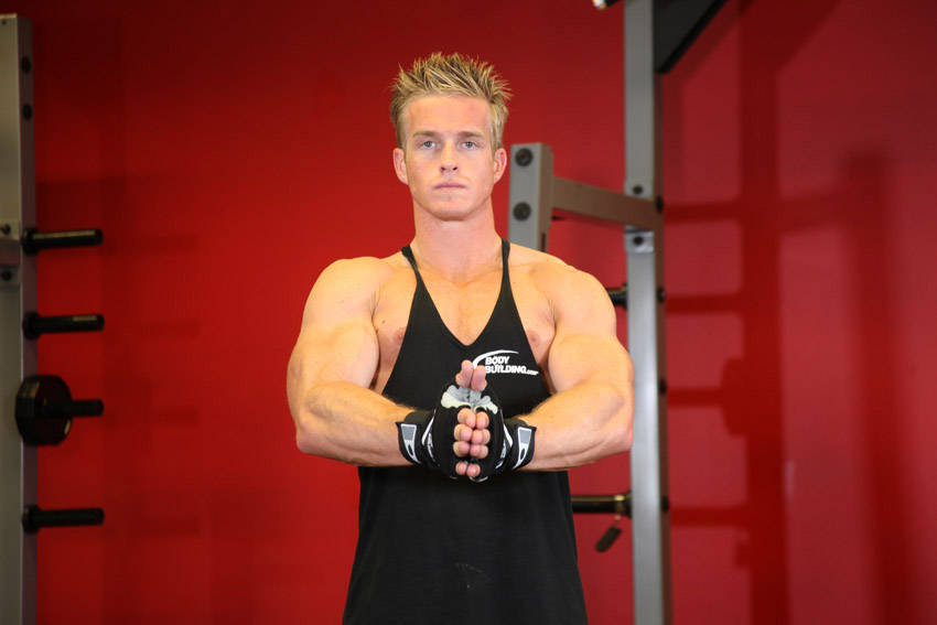 Isometric Chest Squeezes — end position