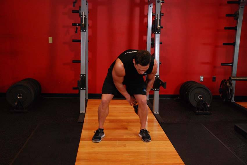 Kettlebell Figure 8 — start position