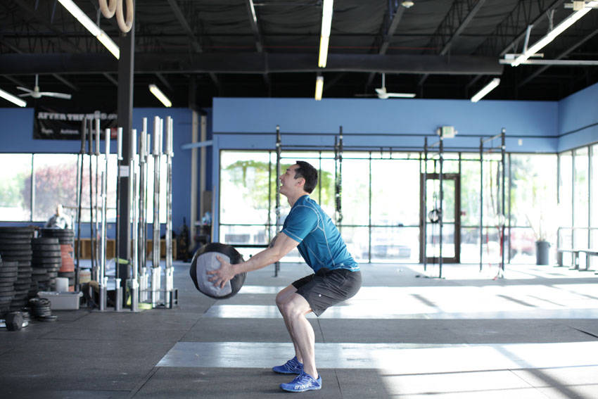 Medicine Ball Scoop Throw — start position