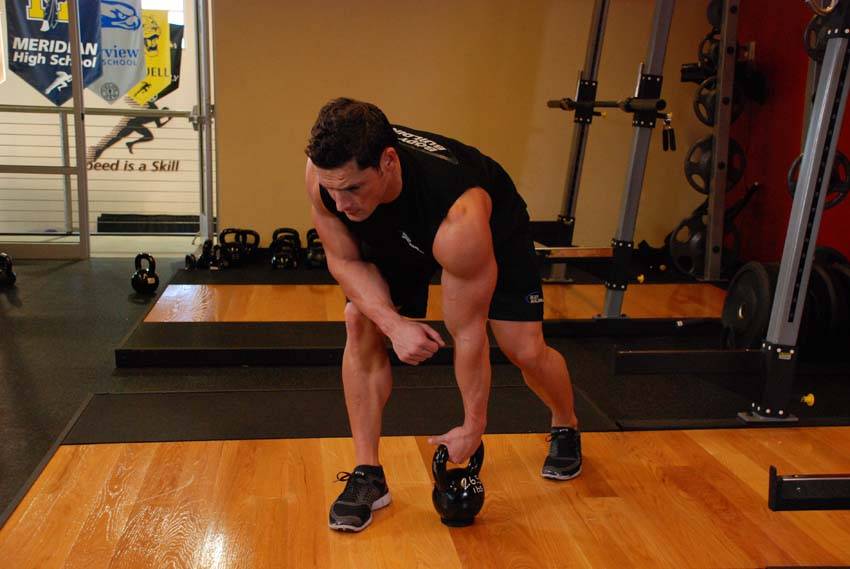 One-Arm Kettlebell Row — start position