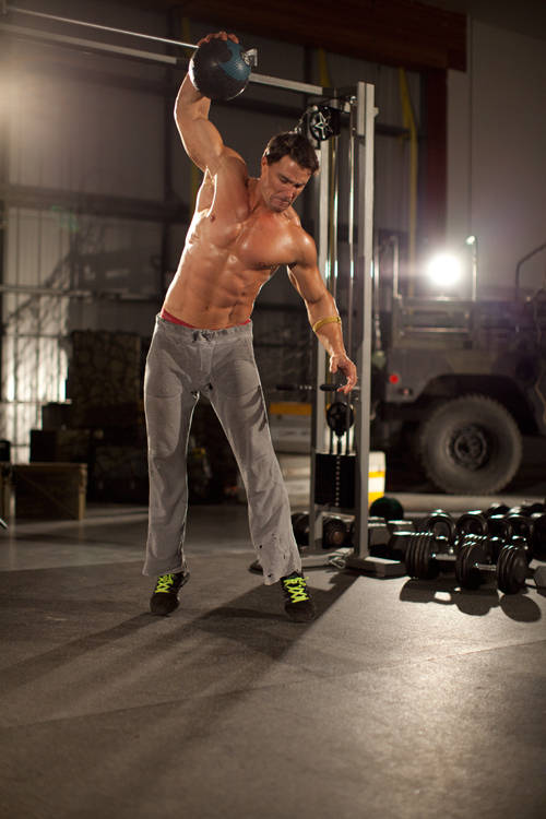 One-Arm Medicine Ball Slam — start position