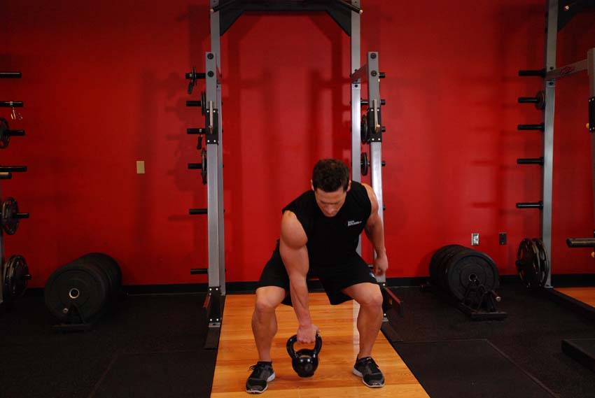 One-Arm Open Palm Kettlebell Clean — start position