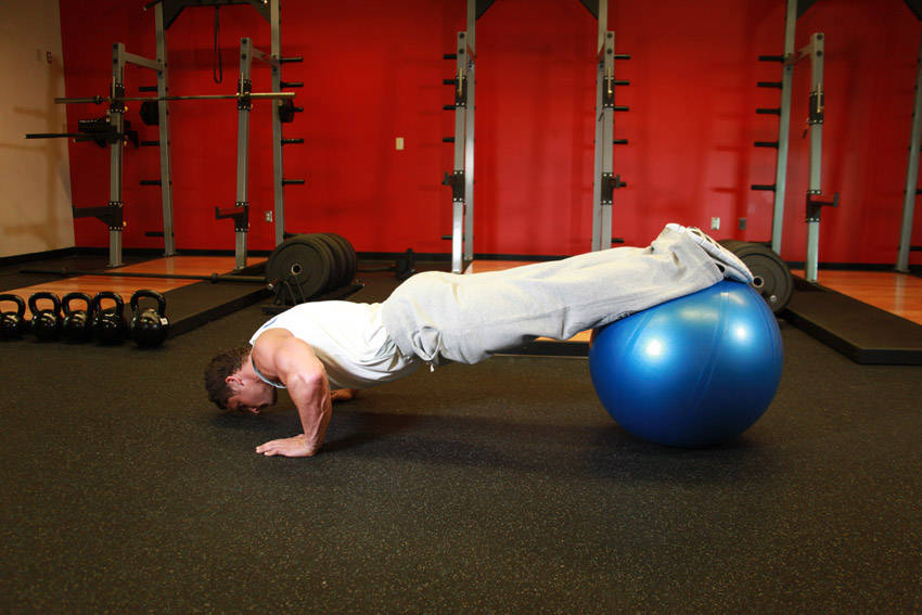 Push-Ups With Feet On An Exercise Ball — start position