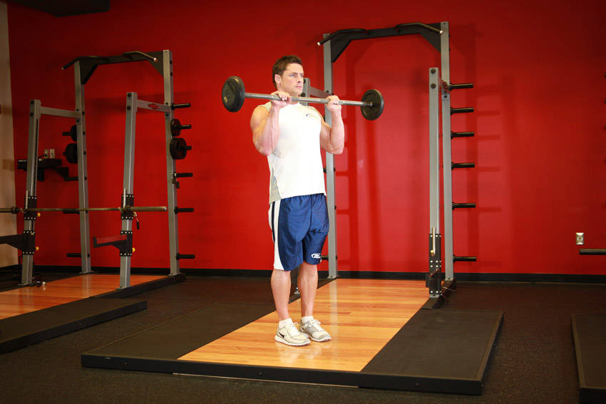 Reverse Barbell Curl — end position