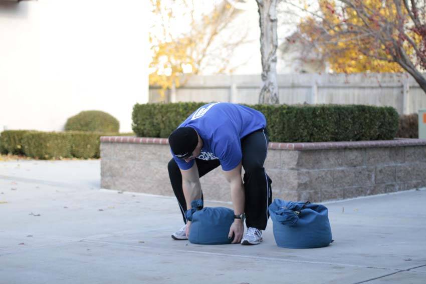 Sandbag Load — start position