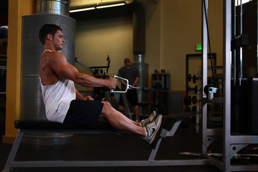 Seated One-arm Cable Pulley Rows — start position