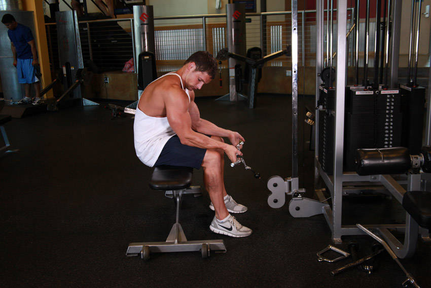 Seated Two-Arm Palms-Up Low-Pulley Wrist Curl — start position