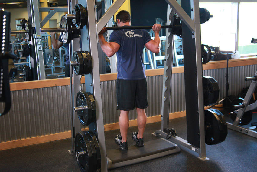 Smith Machine Reverse Calf Raises — start position