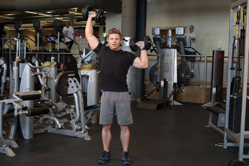 Standing Alternating Dumbbell Press — end position
