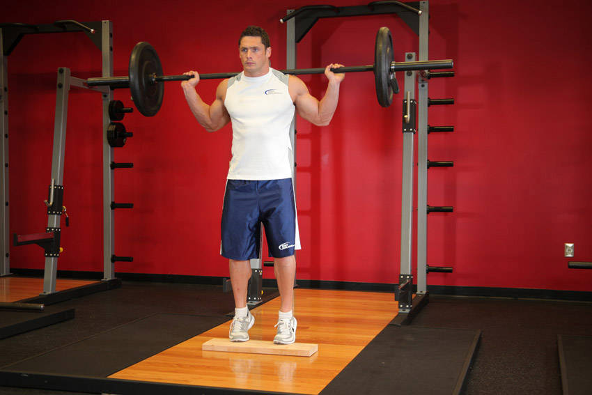 Standing Barbell Calf Raise — start position