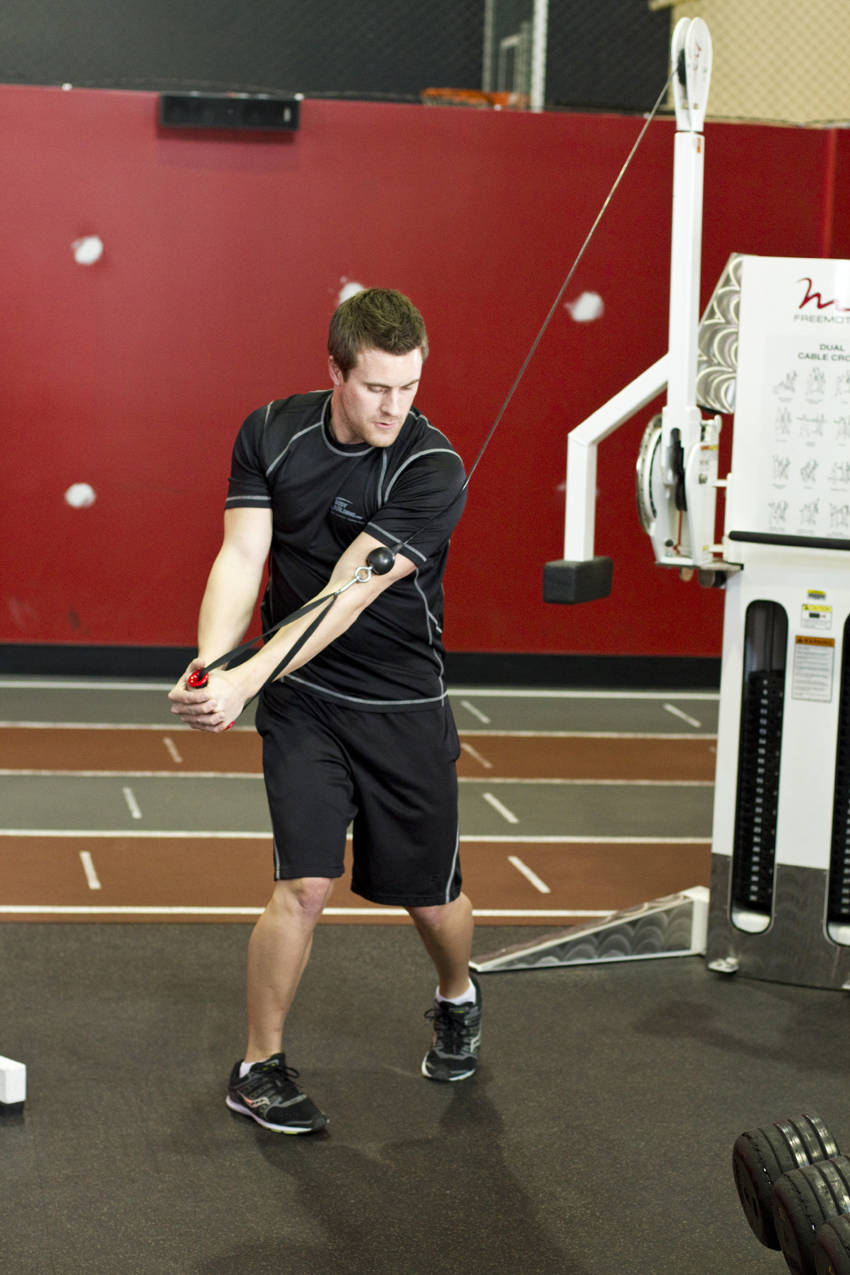 Standing Cable Wood Chop — end position