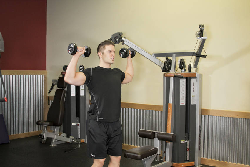 Standing Dumbbell Press — start position