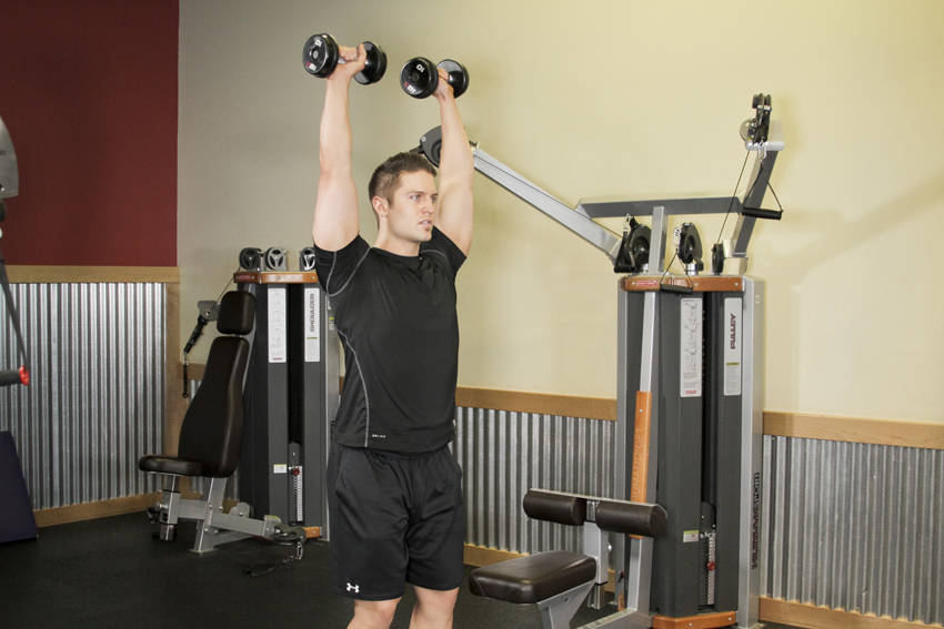 Standing Dumbbell Press — end position