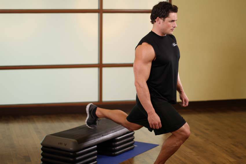 Standing Elevated Quad Stretch — start position