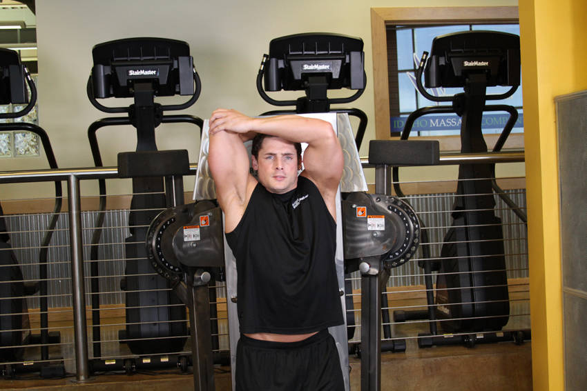 Standing Low-Pulley One-Arm Triceps Extension — start position