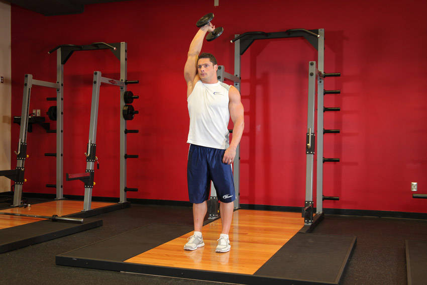 Standing One-Arm Dumbbell Triceps Extension — start position