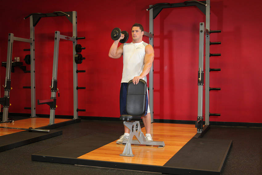 Standing Palm-In One-Arm Dumbbell Press — start position