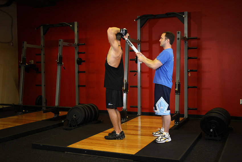 Standing Towel Triceps Extension — start position