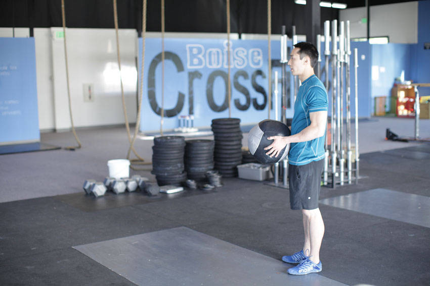 Standing Two-Arm Overhead Throw — start position