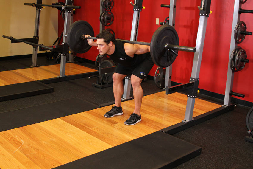 Stiff Leg Barbell Good Morning — end position