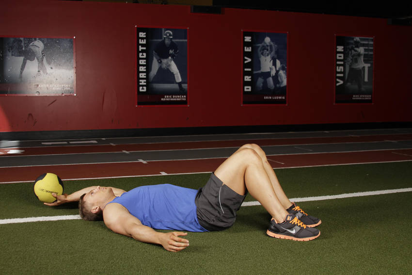 Supine One-Arm Overhead Throw — start position