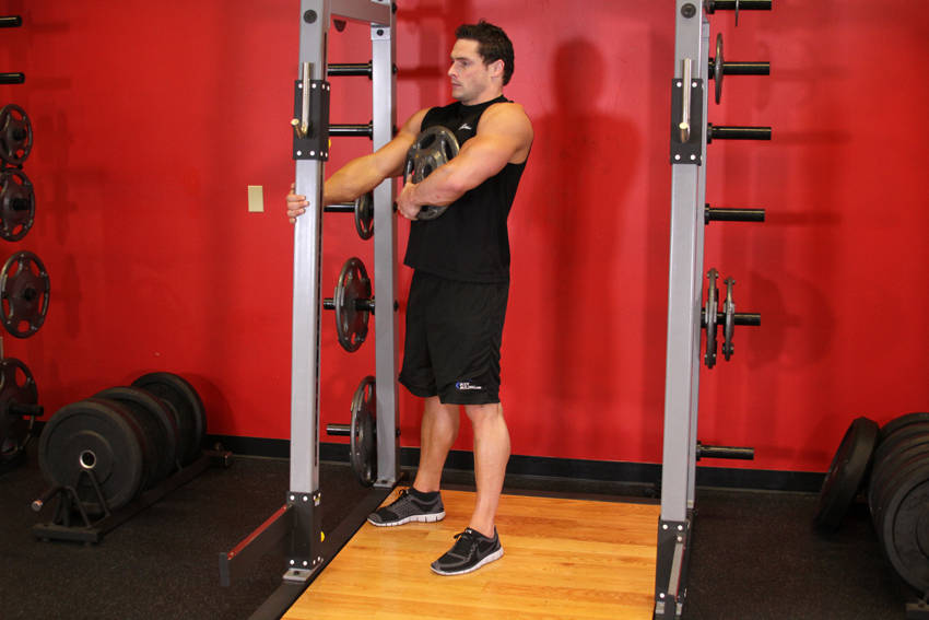 Weighted Sissy Squat — start position