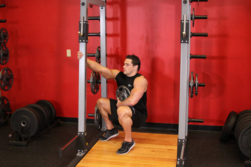 Weighted Sissy Squat — end position