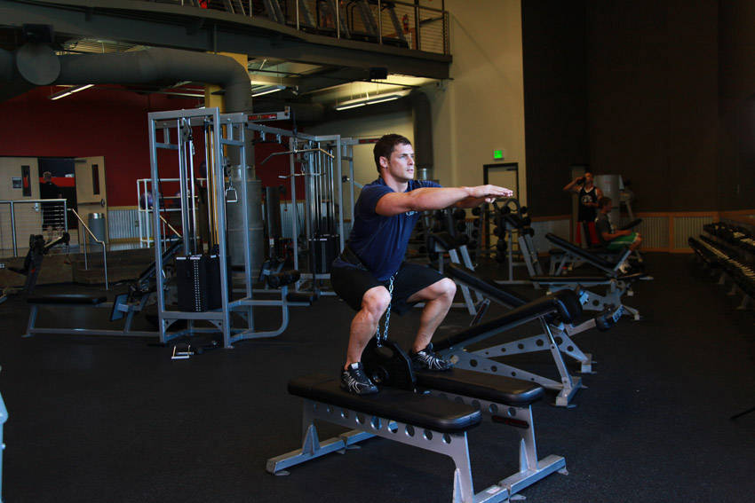 Weighted Squat — end position